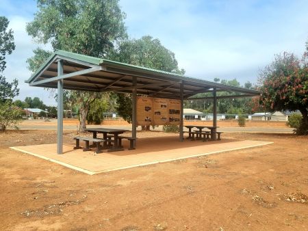 Seating under and open veranda.