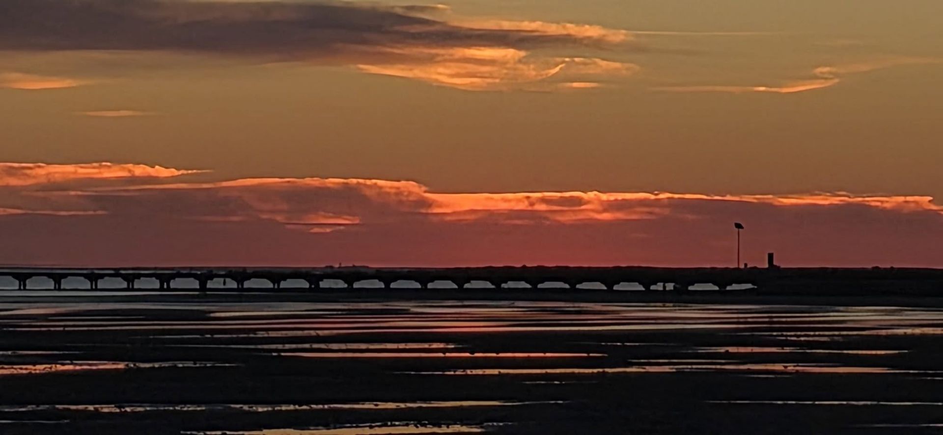 Port Germein in a deep orange sunset.